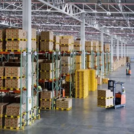 Warehouse aisles with stocked pallet racking